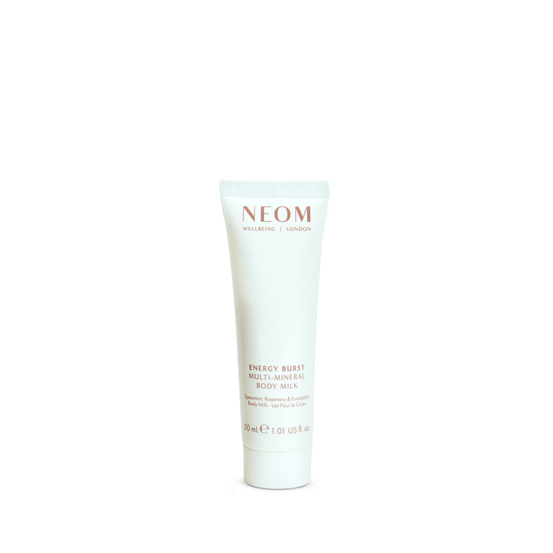 NEOM body milk on a white background