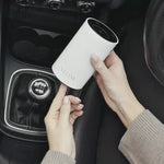 NEOM Pod Mini+ in White with essential oil being used in the car