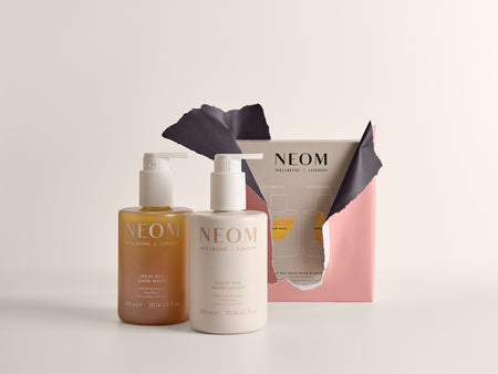 NEOM Great Day hand wash and hand lotion gift set with branded box on neutral background.