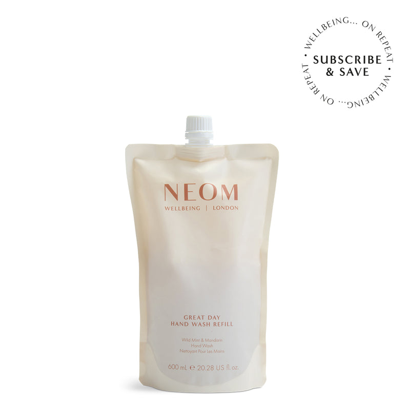 NEOM Great Day Hand Wash on a white background with subscription roundel
