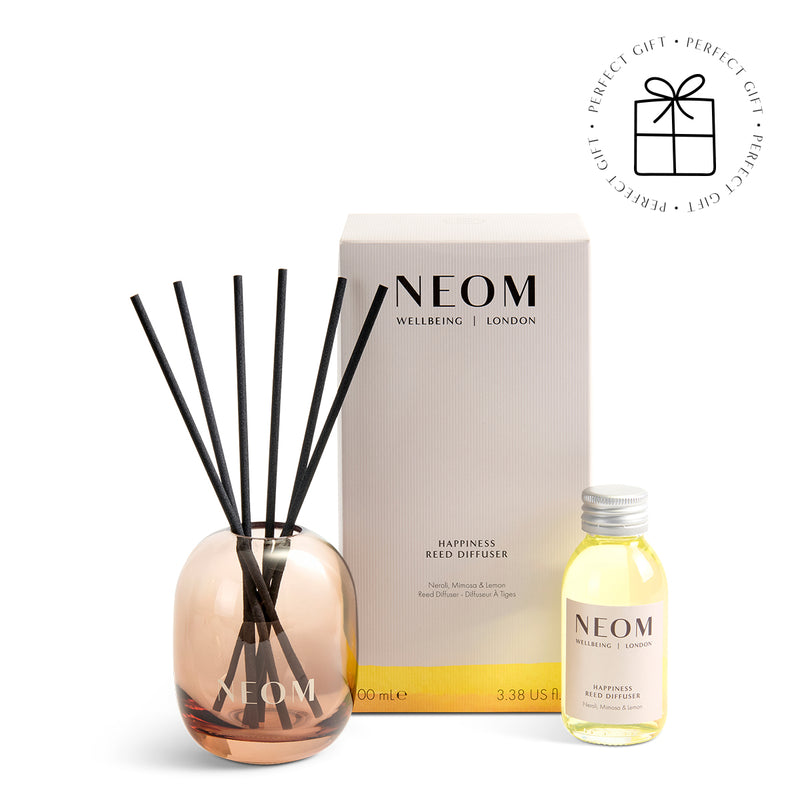NEOM  Happiness Reed Diffuser set with packaging on a white background