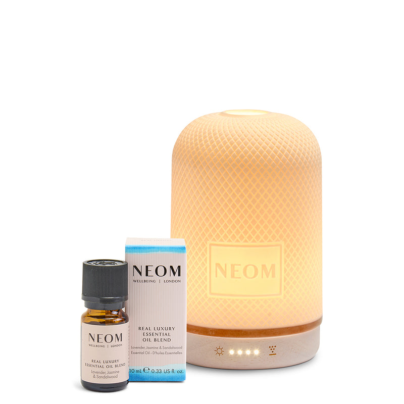 NEOM Wellbeing Real Luxury Essential Oil Blend 10ml with the electric Wellbeing Pod diffuser