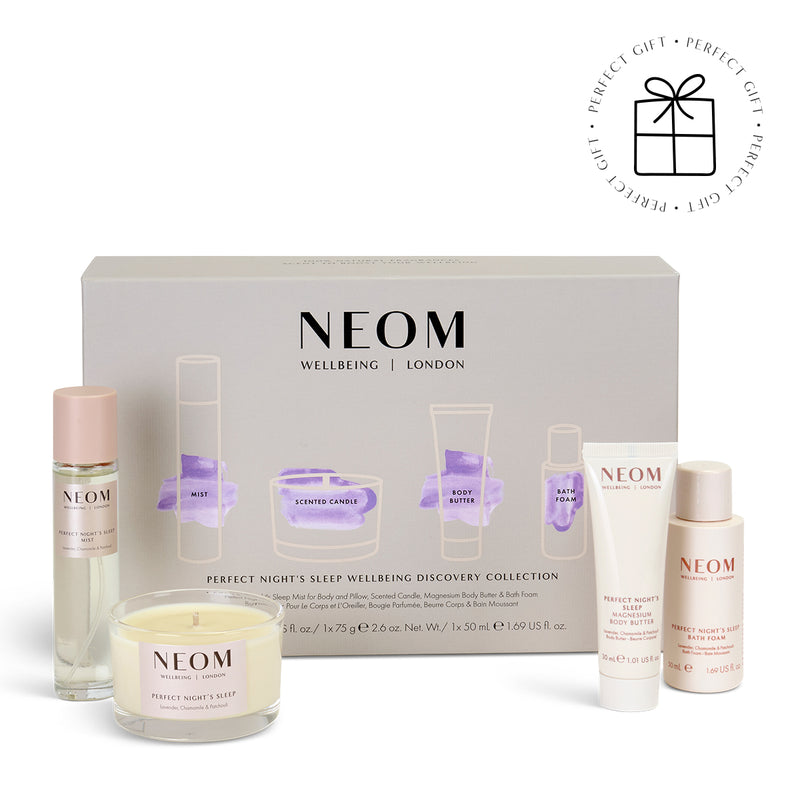 NEOM wellbeing collection with various products on a white background with a Perfect Gift roundel with a present