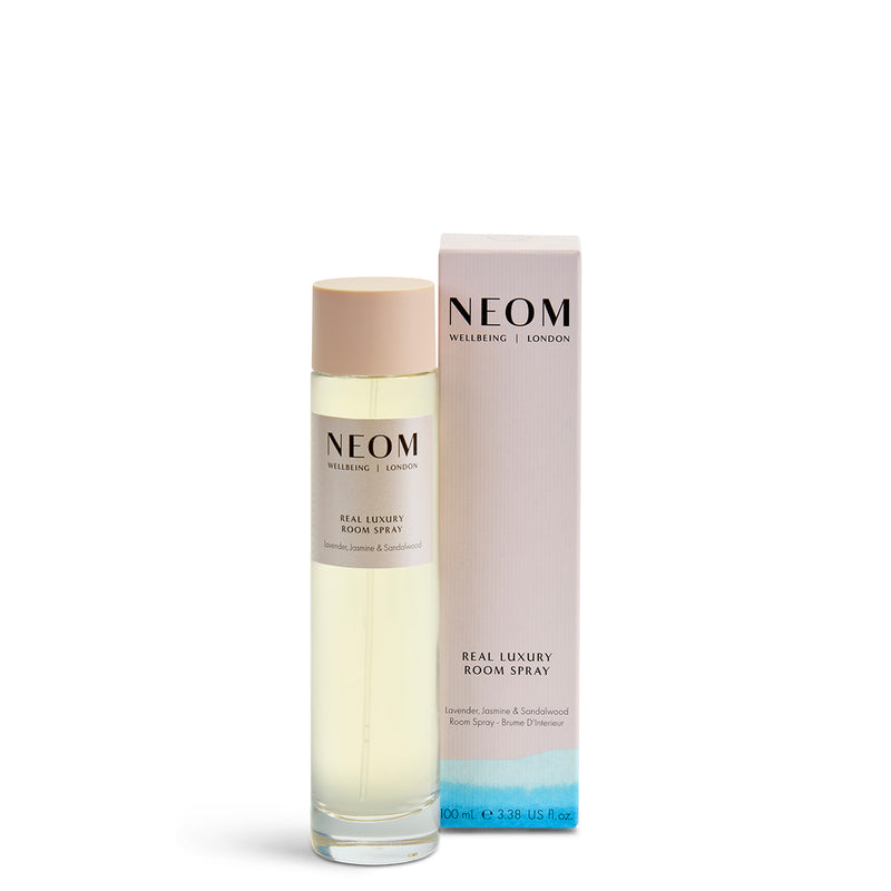 NEOM Real Luxury Room Spray bottle and packaging on a white background