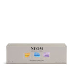 NEOM candle trio packaging on a white background